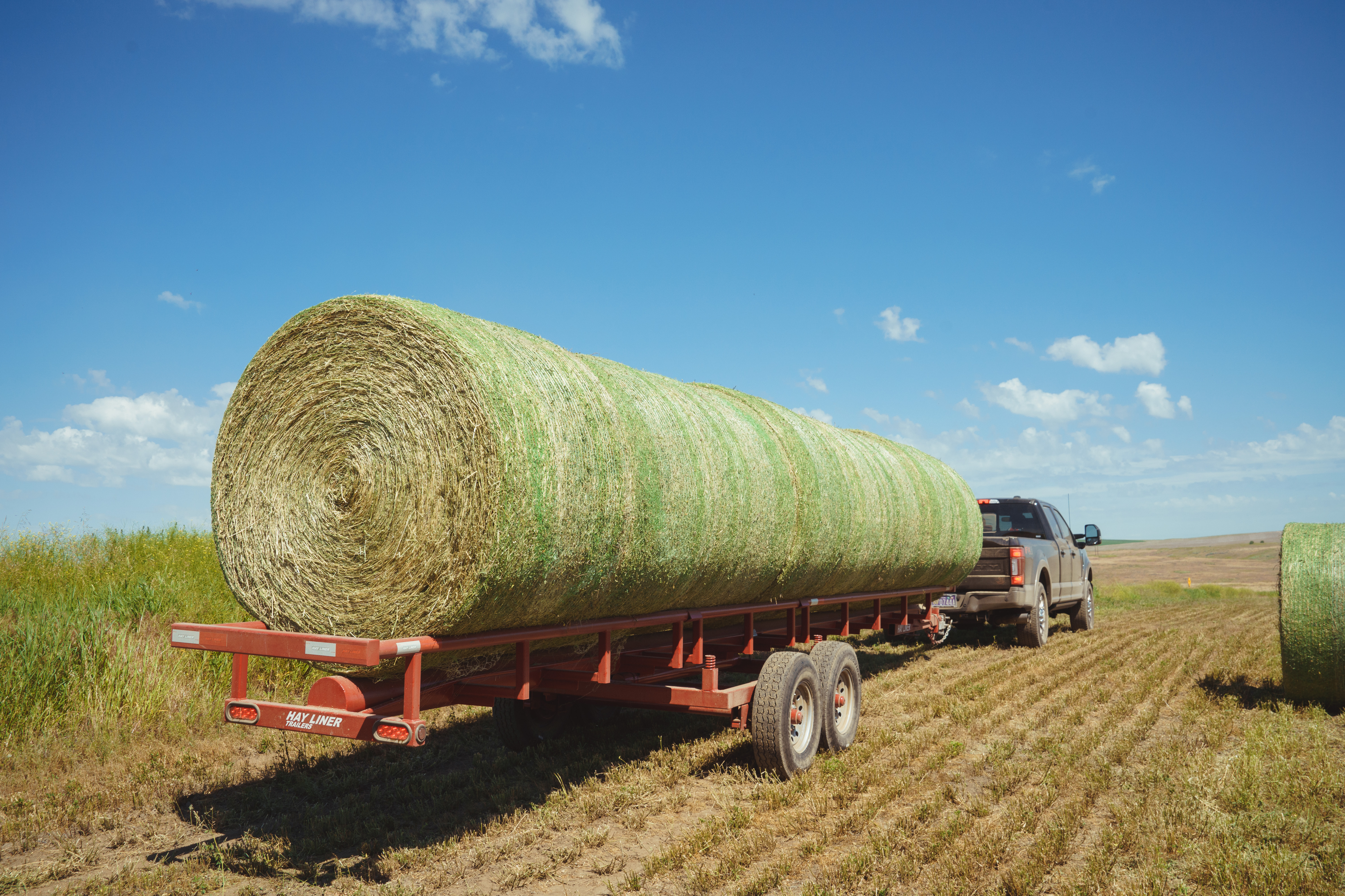 F350 hauling hay bales